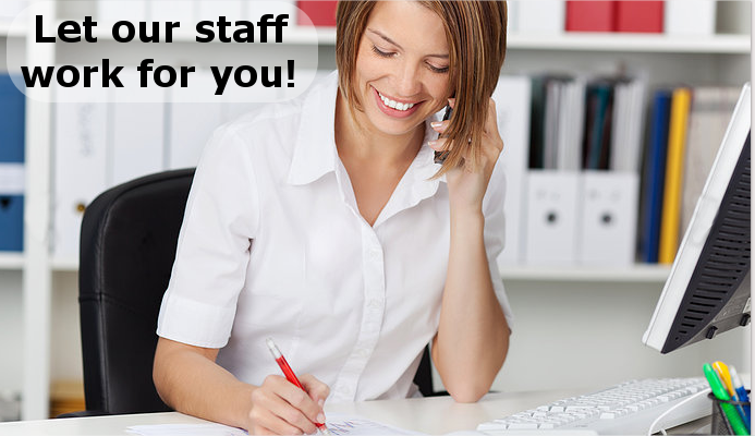 Medical office administrator managing practice operations at her desk